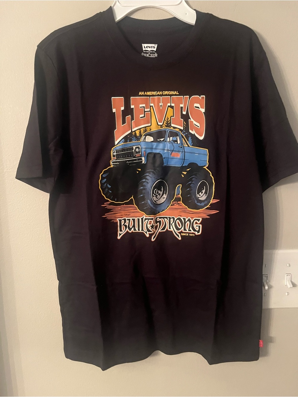 Levi's Black Tee with Blue Monster Truck Graphic